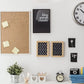 Picture hanging hardware kit components with gold hooks, screws, and wire on display board