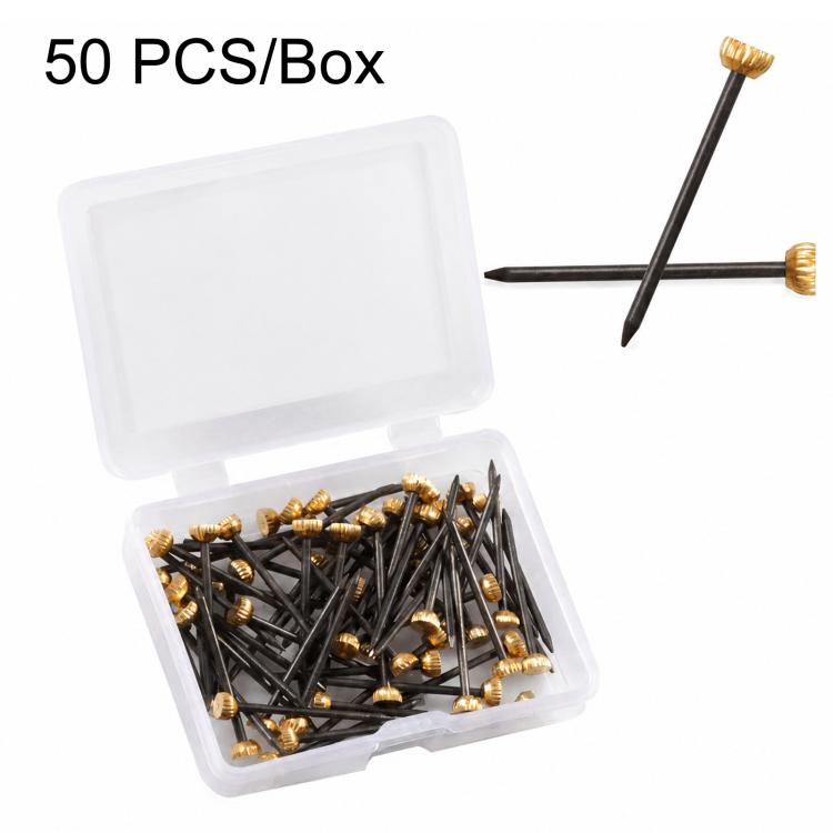 Plastic box of picture hanging nails, black shafts with brass round heads