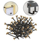 Picture hanging nail set, many black nails with brass round heads spread out