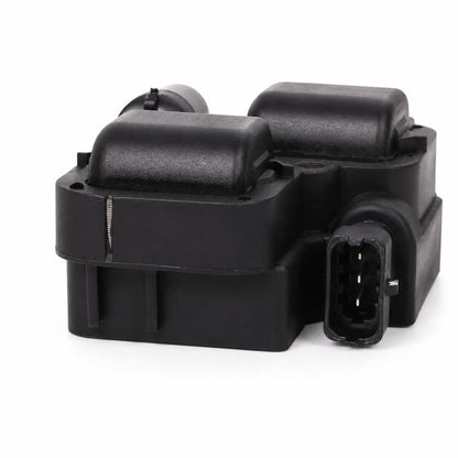 Black ignition coil module with two top caps and a front 4-pin connector