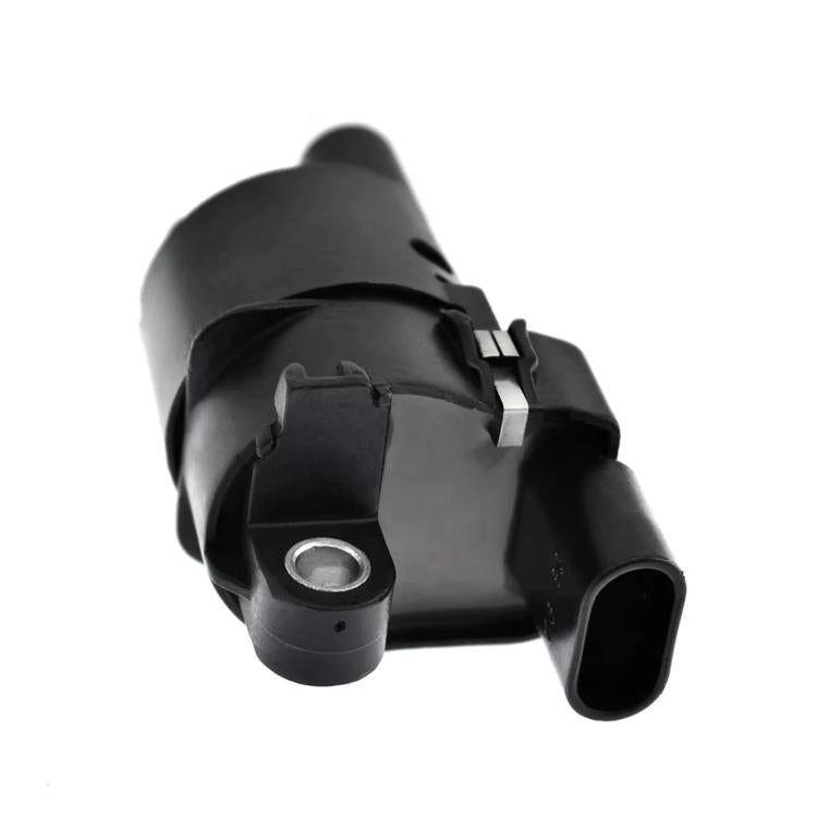 Black ignition coil showing electrical plug and circular metal mounting point