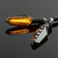 Motorcycle LED turn signal pair with amber sequential arrow LEDs and angled black mounting