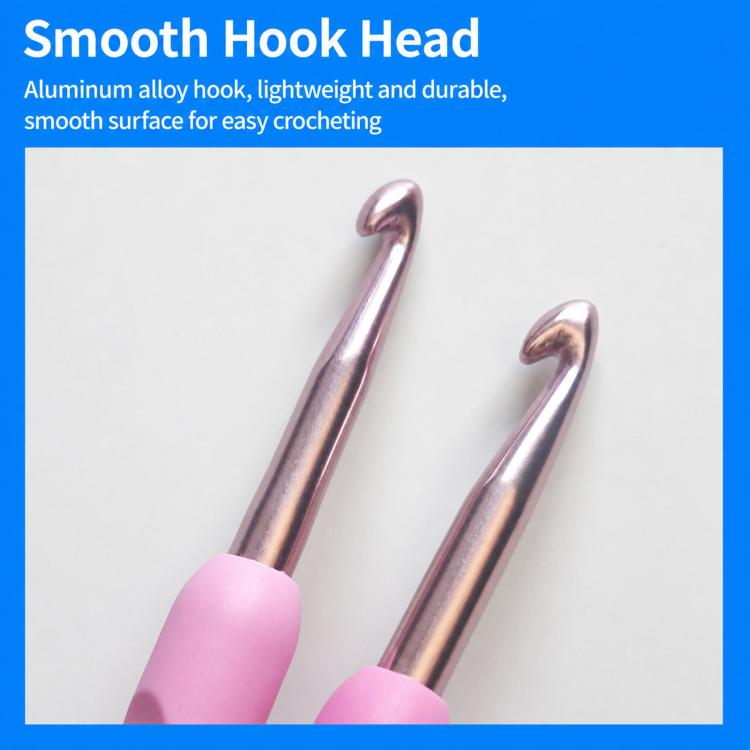 Pair of aluminum crochet hook heads with smooth metal tips and pink soft handles