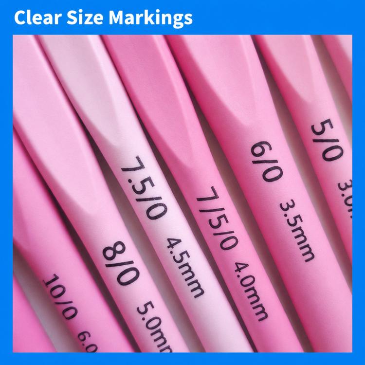 Close-up of pink crochet hook shafts with clear size markings and numbers