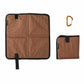Brown foldable camping seat pad with carabiner, square foam mat with carrying tab