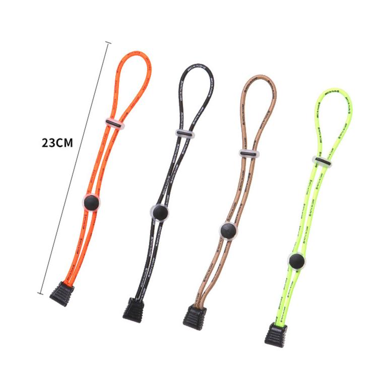 Set of four elastic bungee tie-down straps in orange, black, khaki, and fluorescent green