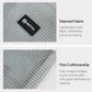 Light gray mesh fabric bottle carrier with black fabric label and stitched edges