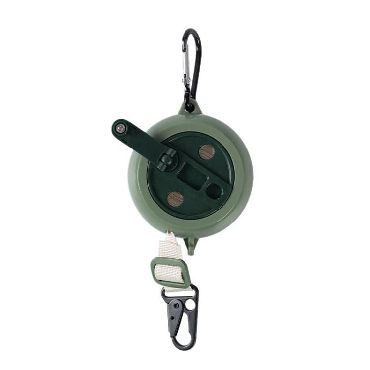 Retractable clothesline reel with green housing, webbing strap, and carabiner hook
