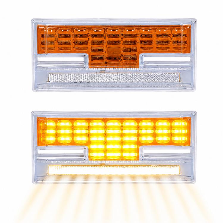 Amber LED truck side marker light with clear housing, glowing light bar and underglow strip