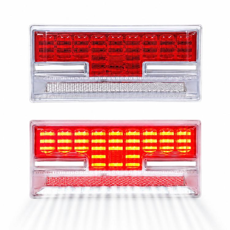 Red LED truck side marker light with clear housing, illuminated grid and underglow reflector strip