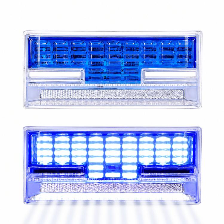 Blue LED truck side marker light with clear housing, lit LED rows and underglow ground strip