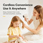 White cordless baby hair dryer held upright, round nozzle grille facing forward
