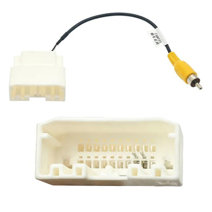 Backup camera cable adapter with white harness connector and yellow RCA plug, black lead wire