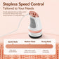 Handheld electric massager with rose-gold top, white body, and black base