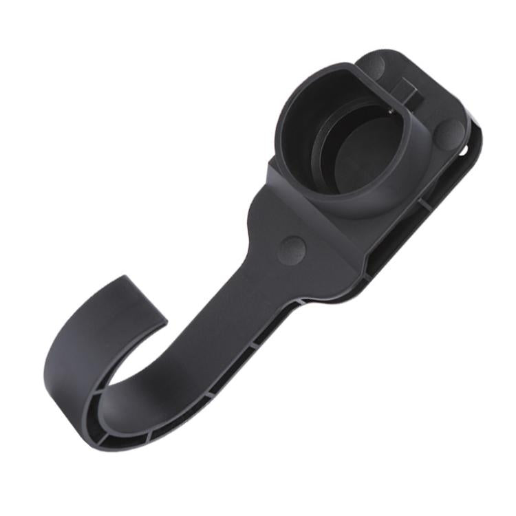Black EV charging plug holster with open cradle for connector insertion