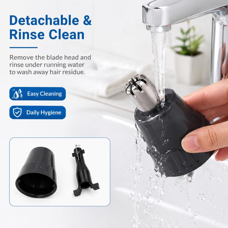 Detachable nose trimmer blade head rinsed under running water, black base