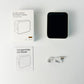Mint green portable label printer with user manual and charging cable