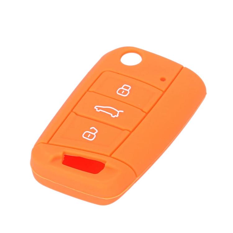 Silicone key cover in orange with three-button icon panel and key blade cutout