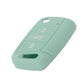 Light green silicone key cover with key ring hole and button cutouts