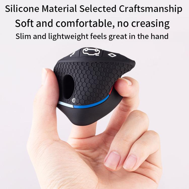 Black silicone key cover held in hand, honeycomb pattern with blue/red accent stripe