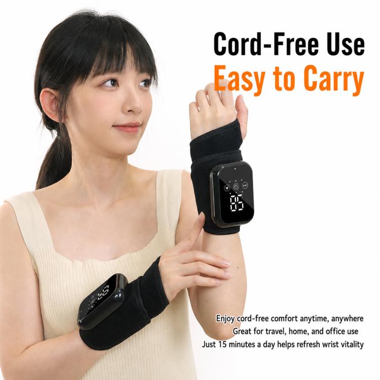 Heated wrist massager held near wrist, black wrap with control screen attachment