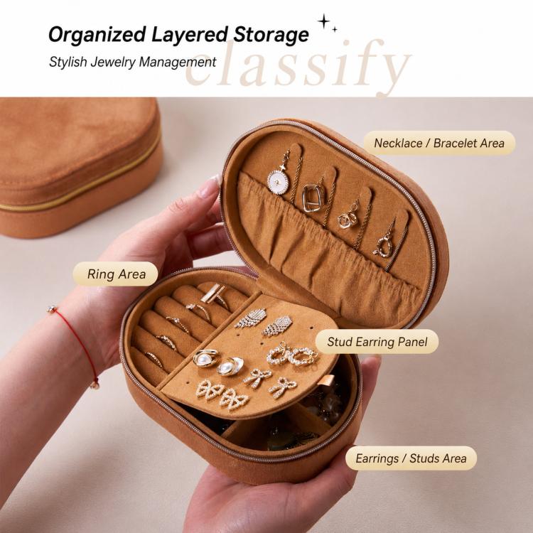 Brown velvet oval jewelry case with zipper, open layout for rings, earrings and necklaces