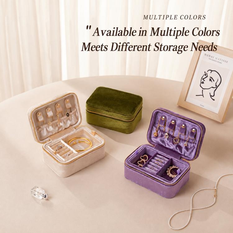 Velvet travel jewelry boxes in multiple colors, including green, purple and cream beige