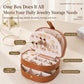 Open brown shell-shaped jewelry box with multi-layer compartments for jewelry storage