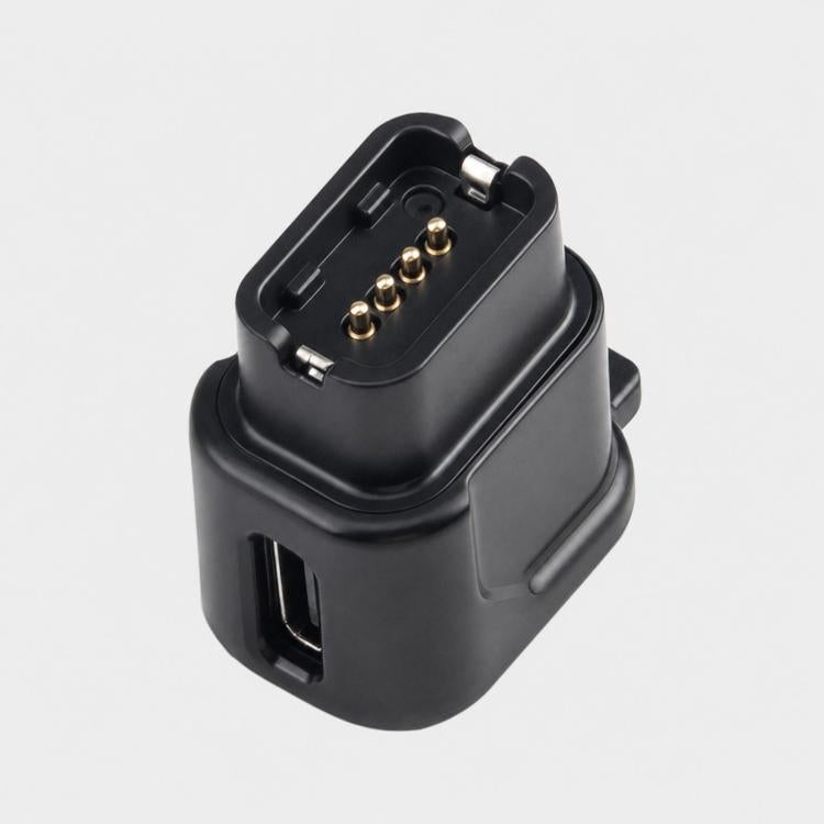 Black bike charging adapter dock with exposed multi-pin contact array