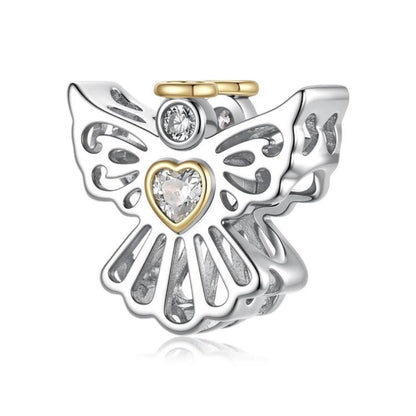 Silver angel charm bead with heart crystal inset and small gold accent top ring