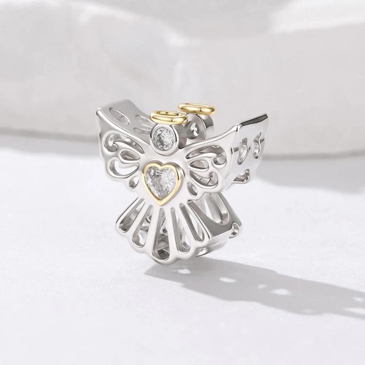 Silver angel charm bead with heart crystal and gold accent ring, side view