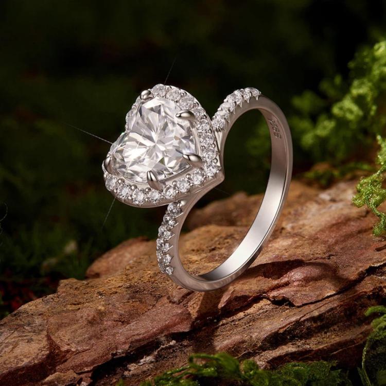 Heart-shaped moissanite ring with pavé band in sterling silver