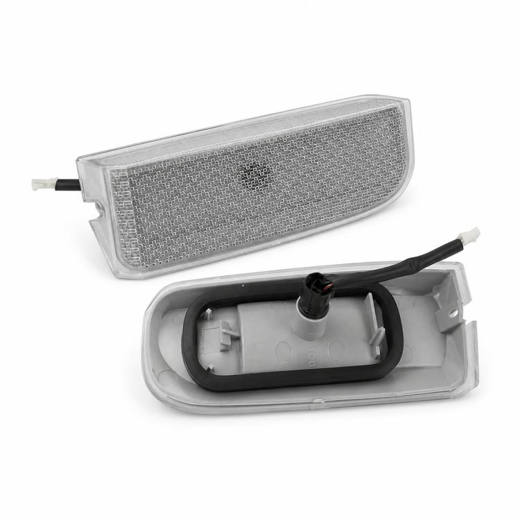 Rear license plate light assembly with clear lens and open mounting base