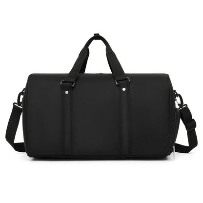Black sports duffle bag with top handles, side straps, and front zipper pocket details