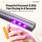 Grey nail drill pen with glowing LED lights and visible hand holding a finger