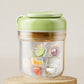 Green ice press cup with lid; clear container holding mixed ice cubes