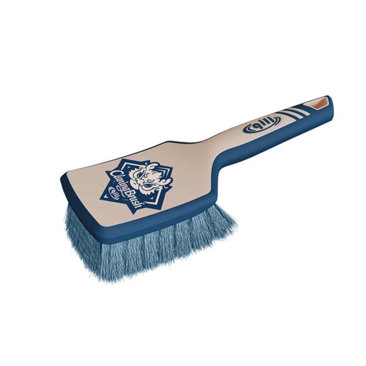 Blue-handled tire brush with light blue bristles and emblem on cleaning pad