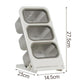 White desktop 3-tier organizer with three slanted gray compartments for pods and tea
