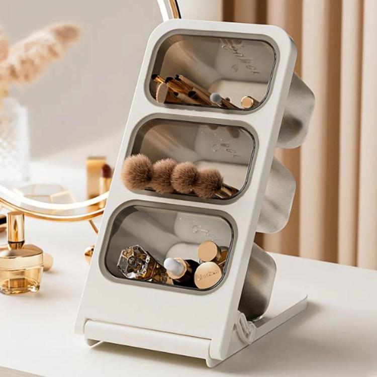White 3-tier slant storage box with three filled compartments for capsules, tea, and snacks