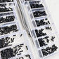 Close-up of clear multi-compartment organizer with black micro Phillips screws