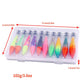 Clear tackle box with assorted colorful squid jigs and umbrella hooks