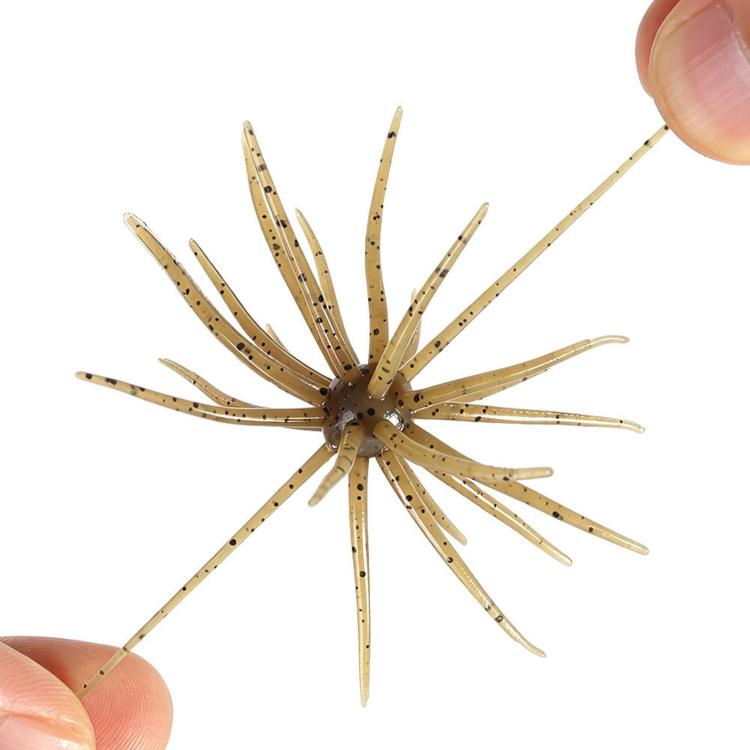 Sea urchin soft fishing lure with beige speckled tentacles and brown center