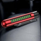 Red car safety hammer with flip-out parking number plate on a car seat