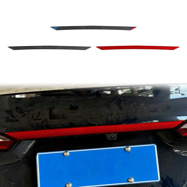 Installed trunk decorative car sticker strip with red accent stripe on black trim