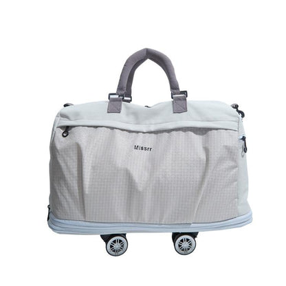 Light grey nylon rolling duffel bag with detachable wheels and padded top handles