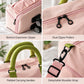 Pink rolling duffel bag with expandable base zipper, padded handles, and detachable strap