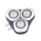 Rotary shaver replacement head, three silver foils on dark gray housing, angled view