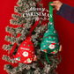 Kids Christmas mini sling bags on tree: green and red crossbody with Santa print