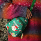 Green kids Christmas mini crossbody bag with zipper, Santa print, dangling plush charm