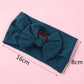 Infant hair bow headband with dark teal fabric band and large knot bow